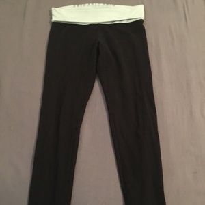 Pink Yoga leggings band is light teal in person